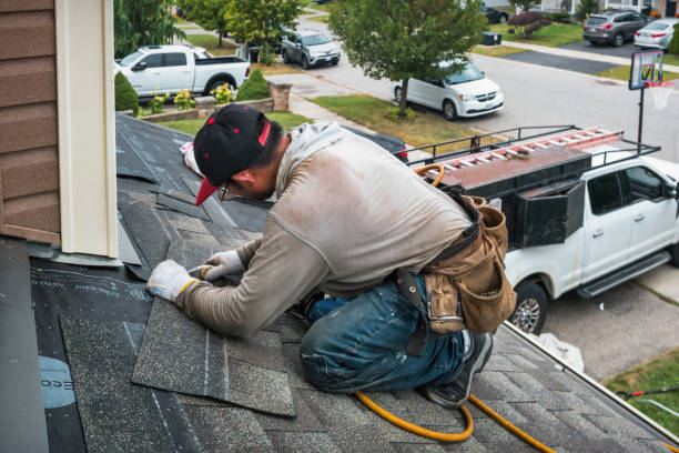 Professional Gutter Repair And Installation technician working in Montpelier, IN